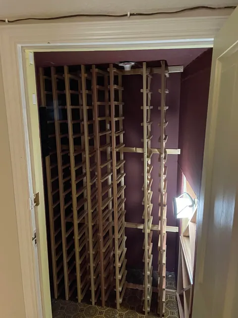 Built a wine closet under some stairs