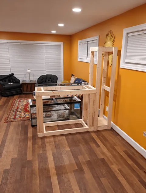 Mid Century-inspired room divider aquarium stand