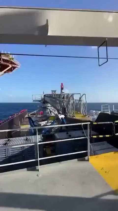 Video of a Stewart platform allowing the crew to safely transfer from an oil rig to a ship. The footage is accelerated to show the effect of the system better.
