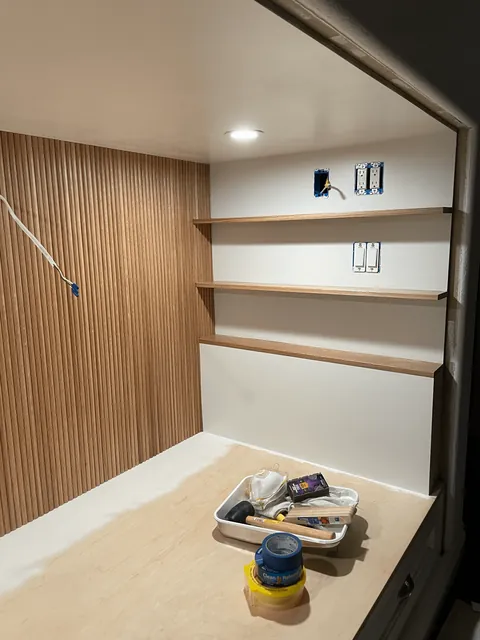 We transformed our 90s entertainment center in a reading nook