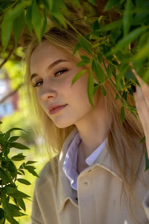 ITAP of a girl in the crown of a willow tree. [portrait]