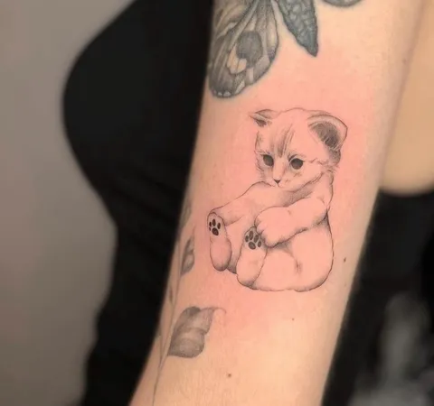 Advice needed: I was told by someone my tattoo looked like a naked baby, what could i do to it to improve it?