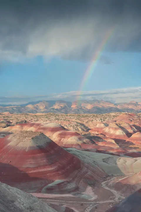 A rainbow after a storm in the deserts of Utah [oc] [1536x2300]