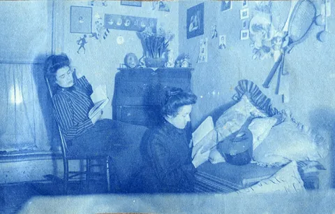 An unnamed young woman recorded her senior year at Asheville Female College in a photo album, Asheville, North Carolina, 1902. It includes a dorm room, group shots of friends, playing in snow, a visit to the mountains, their final midnight party before graduation, and graduation day itself.