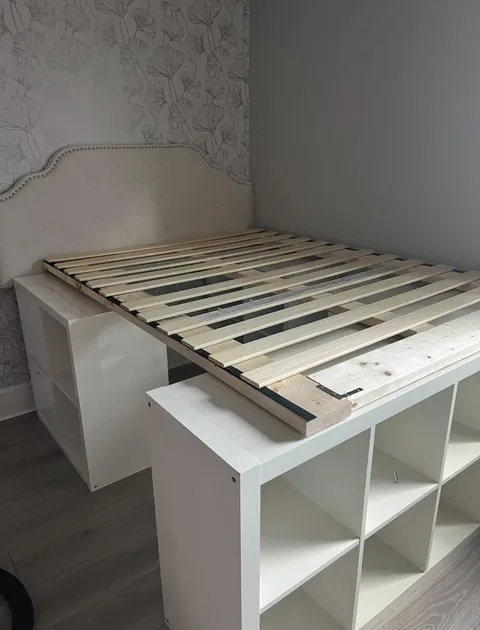 Built a storage bed with thrifted shelves