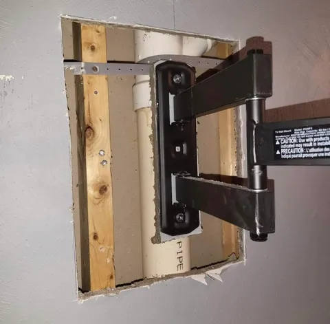 Geek squad mounted my TV to the sewage pipe