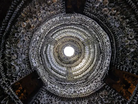 A man in 1835 was digging a duck pond and accidentally uncovered a 70-foot tunnel made of 2,000 sq ft of mosaic made from 4.6 million shells (mussels, cockles, whelks, limpets, oysters, scallops).