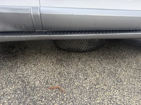 Guy’s spare tire fell off right after I switched lanes. I ran it over and it got stuck under my car had to call the police to get it out. Now need to take car to the mechanic.