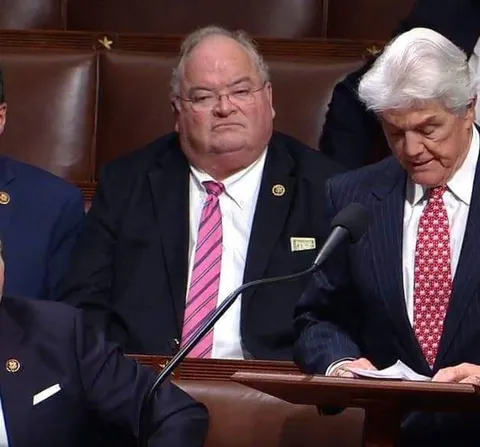 This politican during the impeachment trial literally has cash coming out of his pocket like a cartoon.