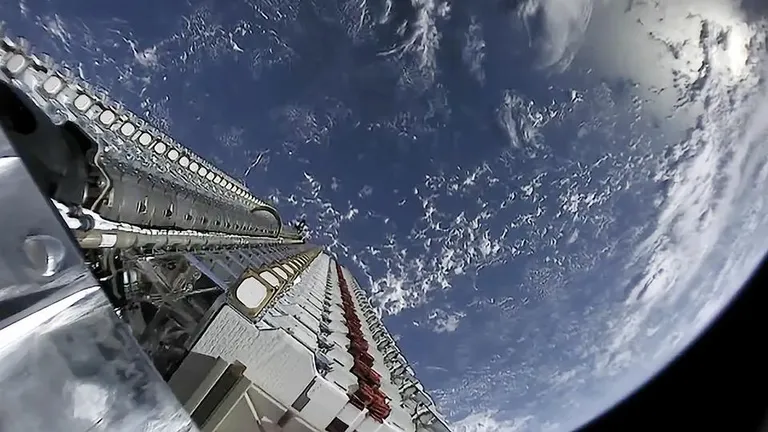 This image shows 60 Starlink satellites shortly after being launched into space and before deployment  on May 24 2019.
