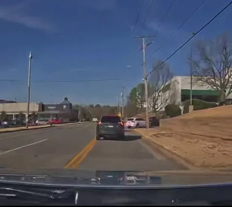 [OC] Nearly T-Boned a dude as he waves hello.