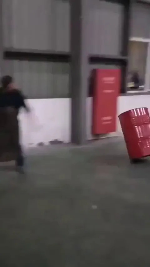 Moving these large barrels in the factory