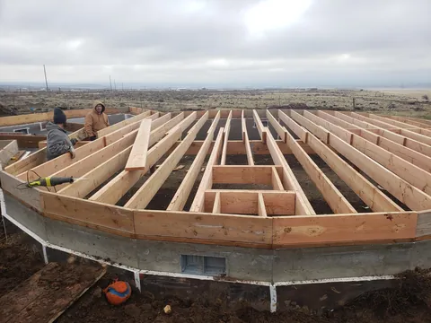 Spent several years building a complete 1300 sq ft roundhouse from top to bottom with my wife, including all framing, electrical, plumbing, HVAC, etc. By far the worst idea we've ever had, and so happy to be in it finally.