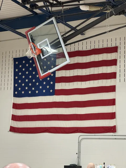 The American flag in this school gymnasium has an upside down star