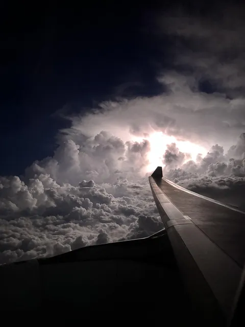 ITAP of my plane flying past a thunderstorm 