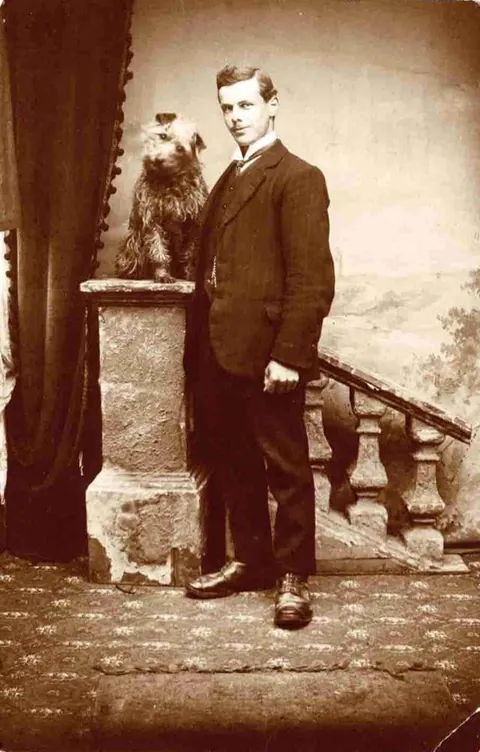 Gentleman pose for photos with their beloved pups, circa 1880-1900