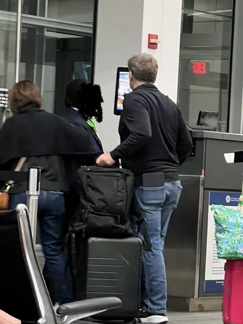 This guy with an entire tablet in his back pocket