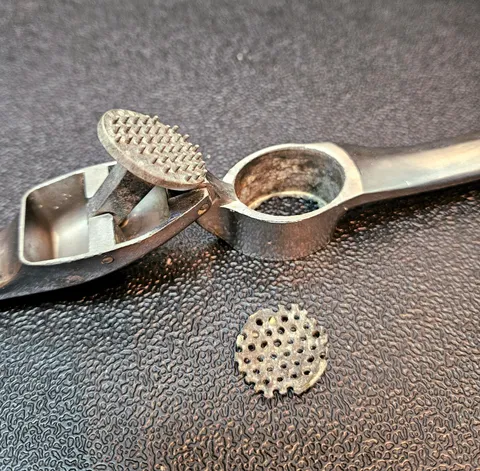 [OC] A garlic press from 1998 finally bit the dust today. RIP