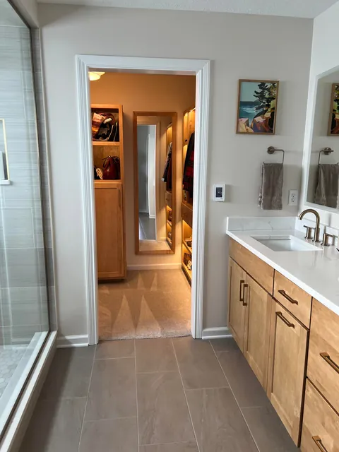 I made custom master closet built-ins with maple and maple plywood, LED lighting