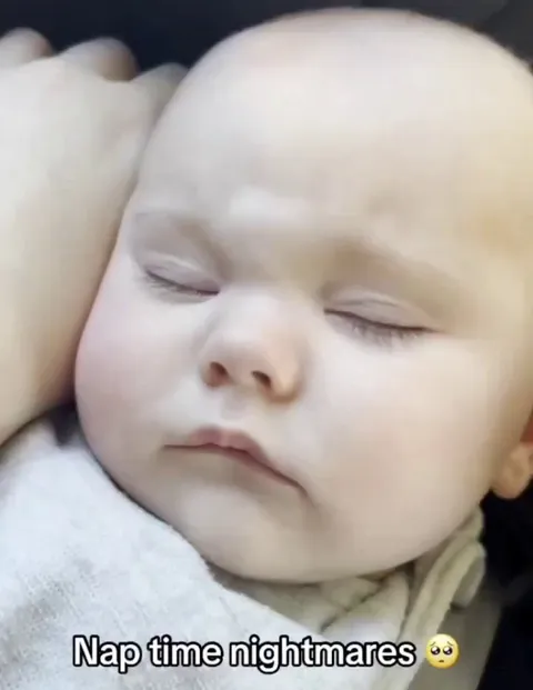 That moment when a baby wakes up from a nightmare and sees his mother in front of him.