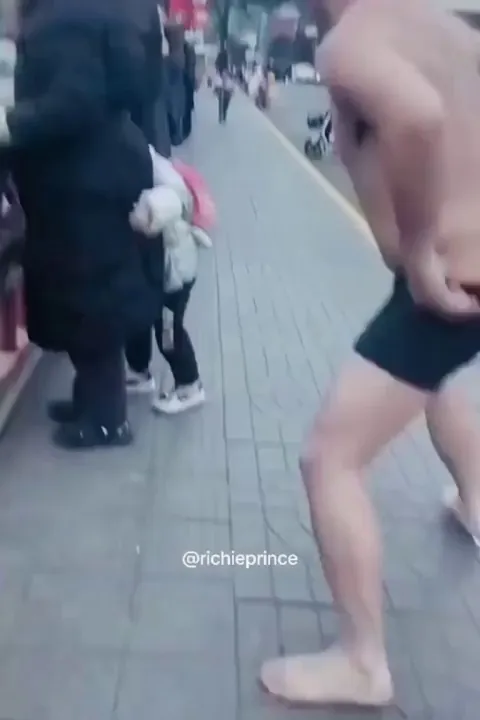 Man strips his clothes and jumps into freezing cold water to save a random person. 