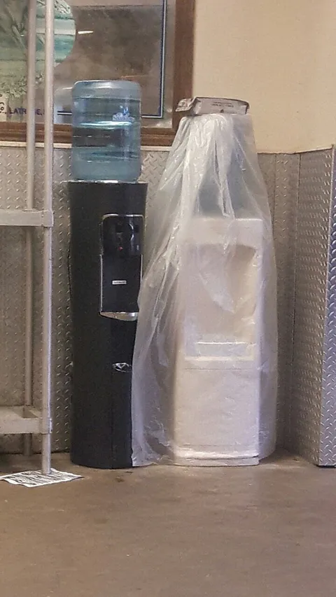 These water jugs look like they're getting married.