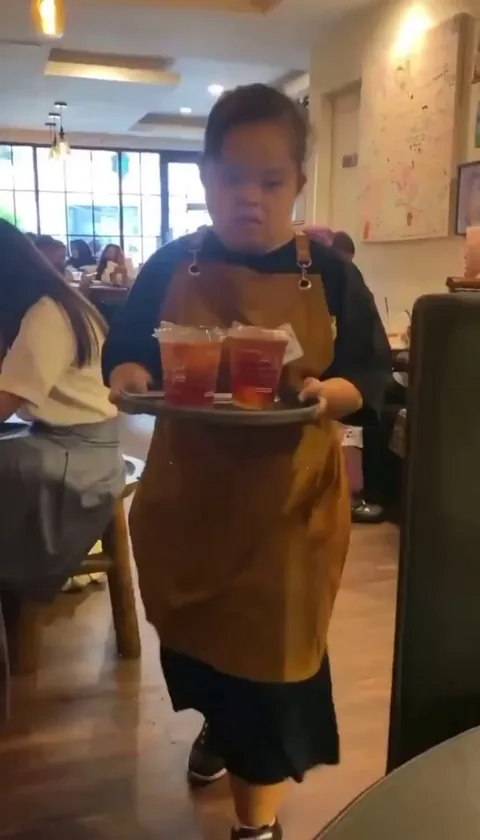 A café employs people with Down syndrome to affirm their humanity and break societal stigmas.