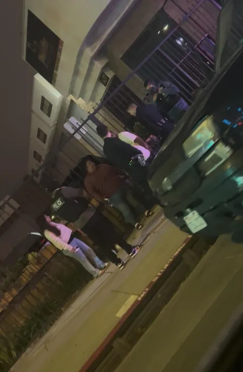 LAPD and ICE lining a Hispanic family up against a wall in San Pedro, California