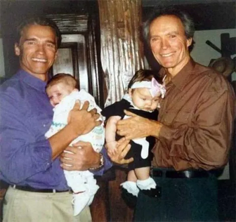 Schwarzenegger with his son Patrick and Eastwood with his daughter Francesca, 1993