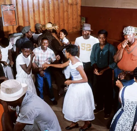 People enjoying a good time in a small "Juke" party, South Carolina, 1956. Kodachrome shot. I think this is a small diner establishment.