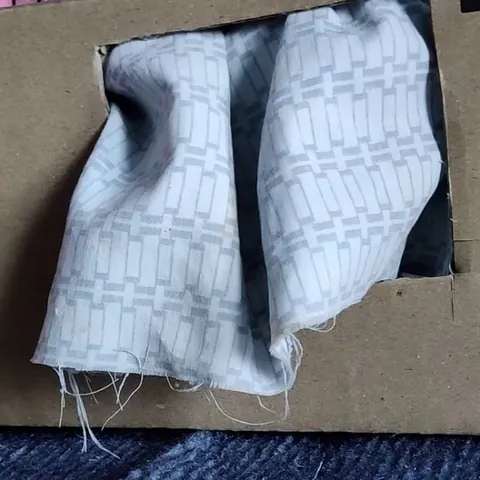 Girthquake and pipsqueak in their cuddle box