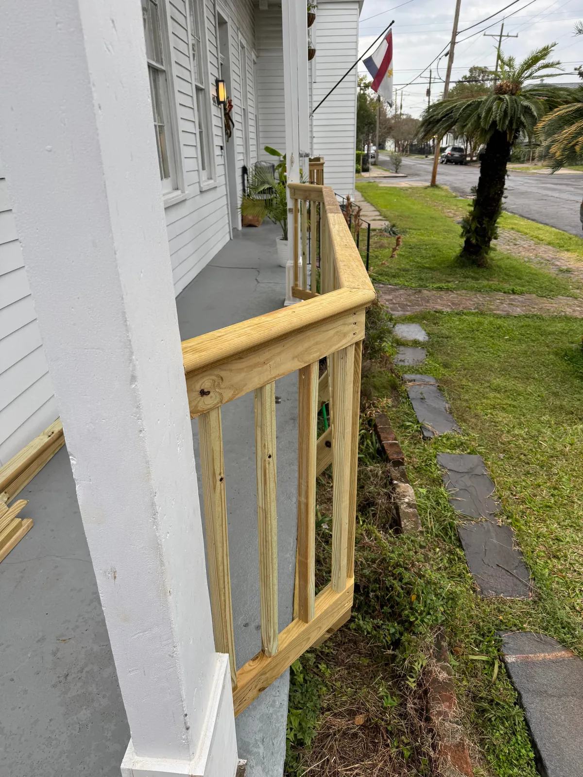 Extended the railing for more front porch space by