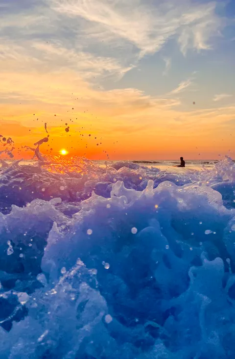 ITAP of a wave on sunset
