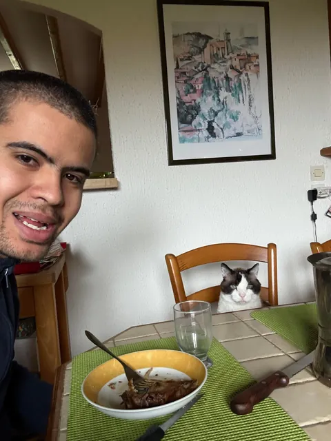 My cat sit next to me every time during dinner. No food begging , just staring, mine is 12 year old.