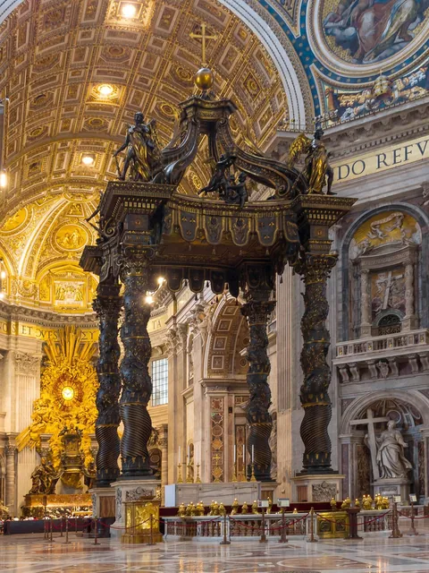 Canopy inside St Peter's Basilica (Vatican), designed by Bernini, completed in 1634, 94 feet tall (28 m), tall like a 6 story building. 