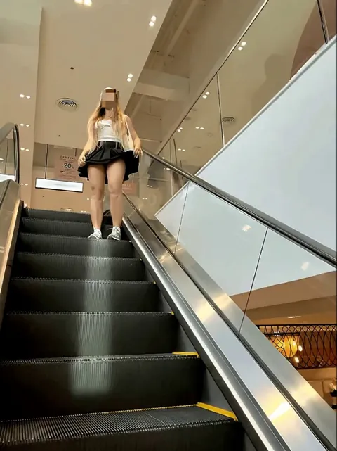 The escalator gave me just enough time to lift my skirt with nothing underneath