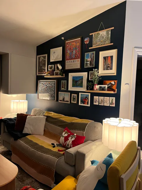 We finally put up our gallery wall in the living room and it feels very cozy!