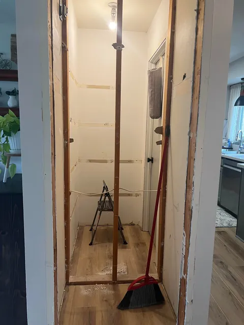 Reclaimed unused coat closet for pantry expansion