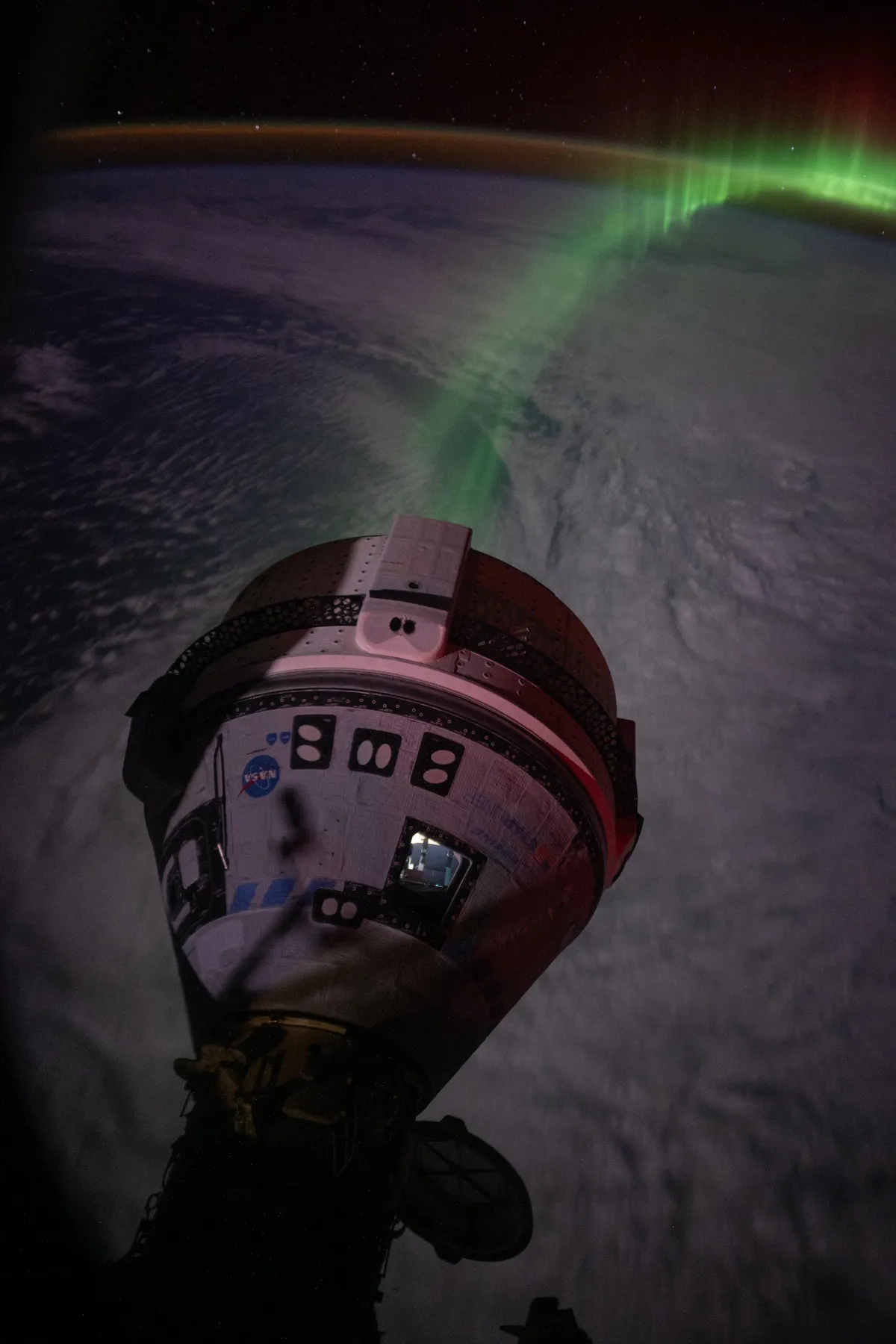 We have been looking at aurora out the cupola windows a lot lately. Starliner  was  doing  some  testing  so  we  decided  to  check  it  out  from  the  Dragon  windows.  Timing was great for the aurora to line up  nicely with Starliner’s service module thrusters.