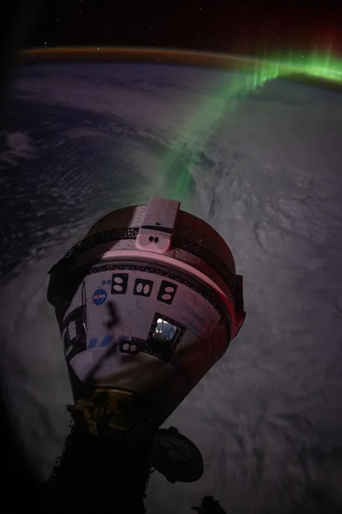 We have been looking at aurora out the cupola windows a lot lately. Starliner  was  doing  some  testing  so  we  decided  to  check  it  out  from  the  Dragon  windows.  Timing was great for the aurora to line up  nicely with Starliner’s service module thrusters.