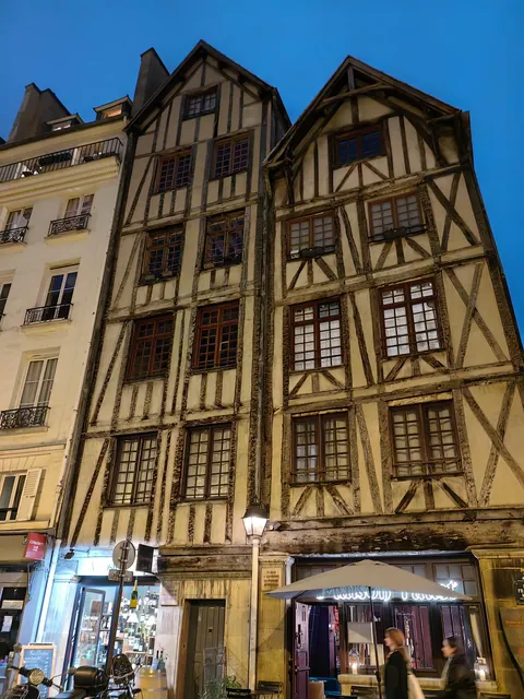 2 of a very few medieval houses still standing in Paris (rue François Miron) [OC]