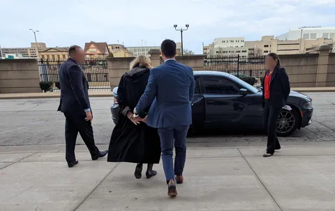 Judge Hannah Dugan being arrested by the FBI for allegedly helping an undocumented immigrant avoid arrest