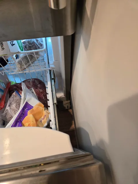 Help: fridges freezer too close for baseboard