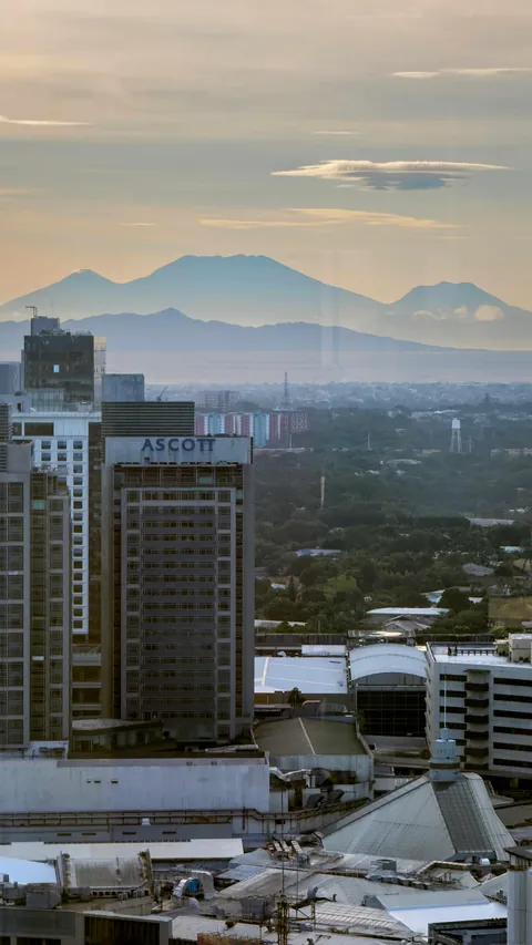 If the sky is clear, look southeast from Makati. Hello Mt. Banahaw!