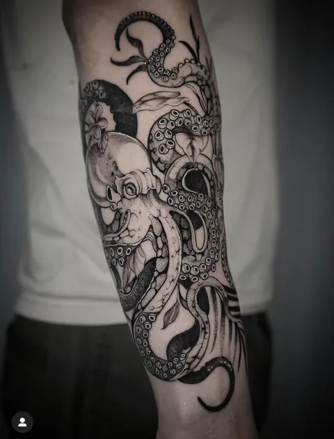 Octopus with Tropical  Plants by Dominique at Lights Out Tattoo in Santa Cruz, CA