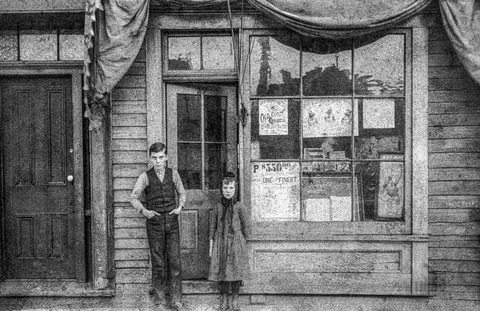My maternal great grandma and her older brother standing outside the family shop located at 27 N. Halstead St. in Chicago around 1890.