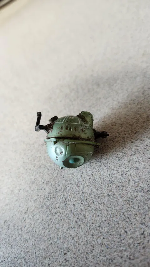 This toy was buried in my yard for years, it changed color from black to green.