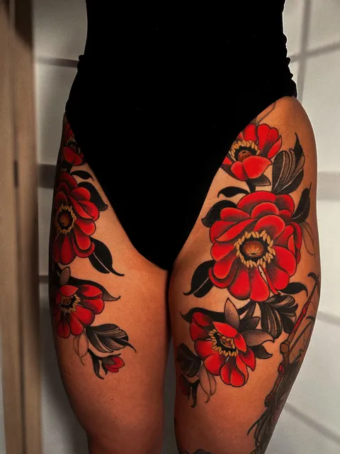 Healed Red Florals by Sarah Amelia Tattoos at Cloak and Dagger, London