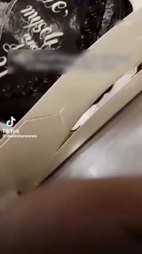 Bakery workers sing happy birthday to customer who ordered a cake for himself with the dedication written: "Me, myself and I".