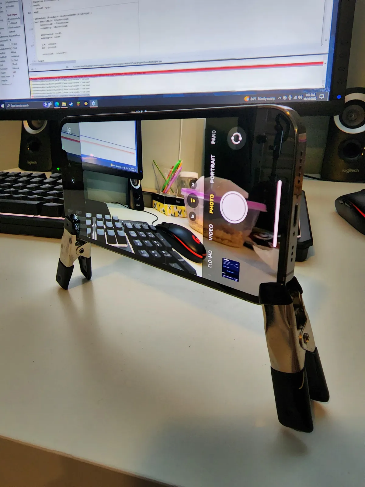 Wifey wanted a family pic for the holidays so used these clips as a phone stand.